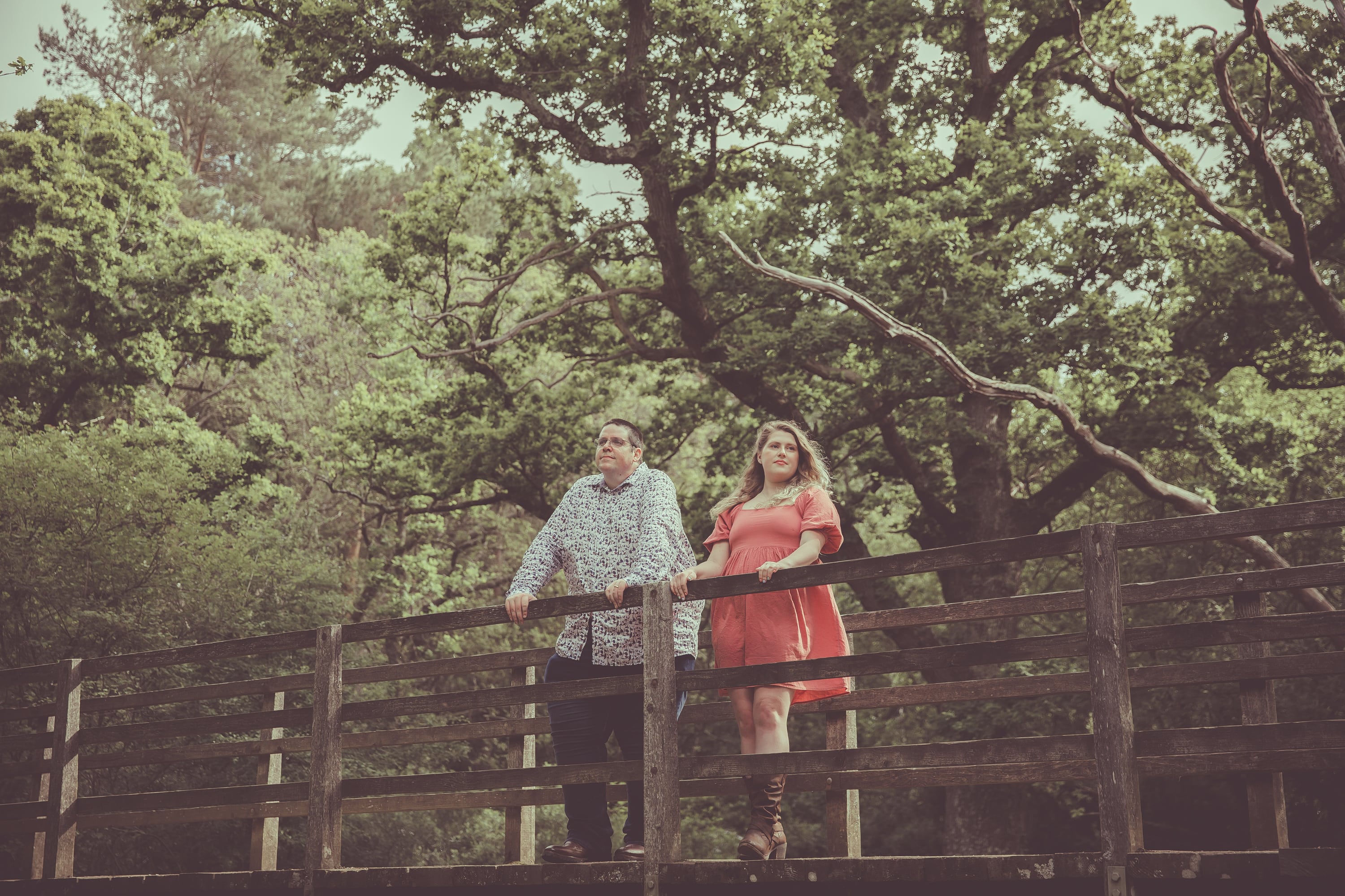 Justin and Emily standing on a river bridge - Foxbridge | Acoustic Folk-Pop Duet